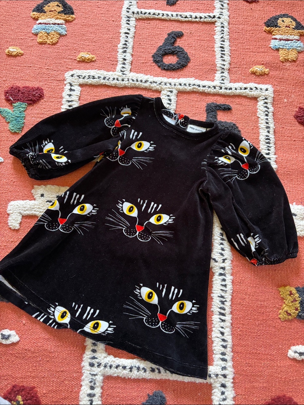 Mini Rodini Black Velvet Cat Face Dress with Yellow and Red Accents